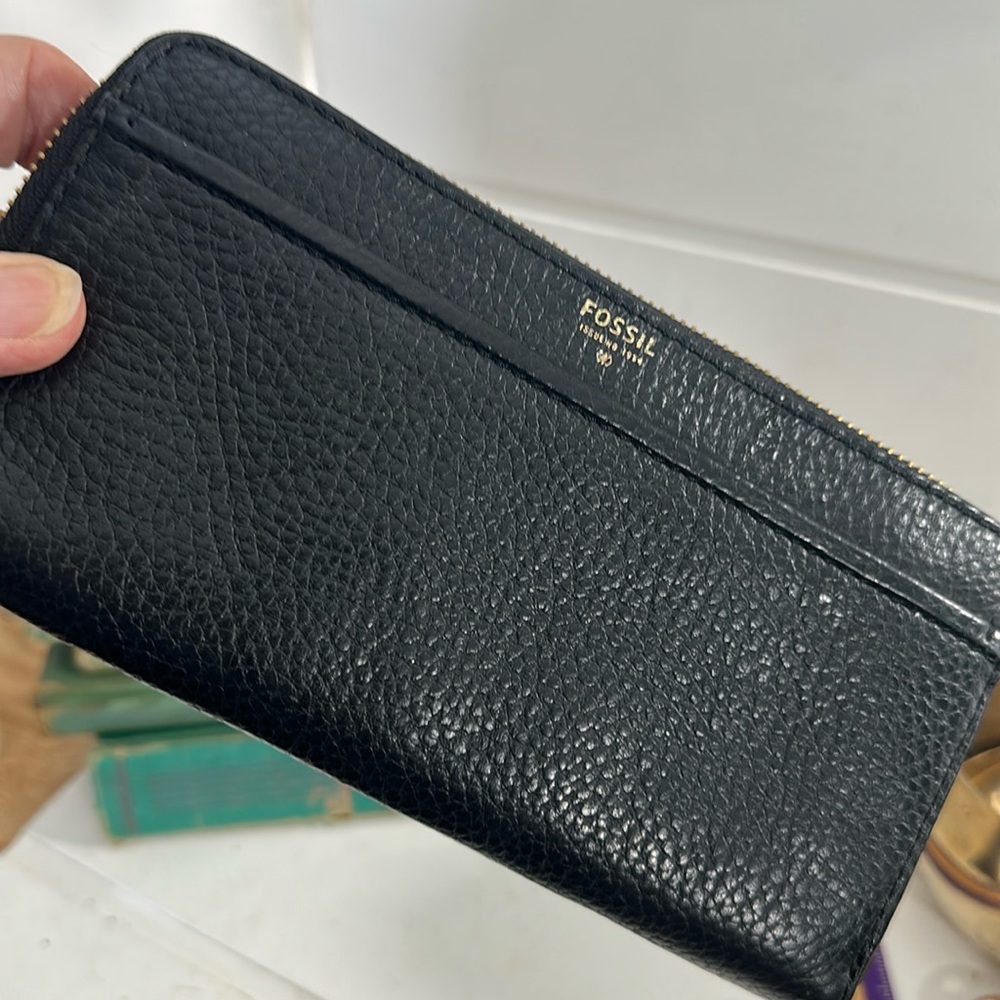 Fossil vintage black pebbled leather check book length wallet.